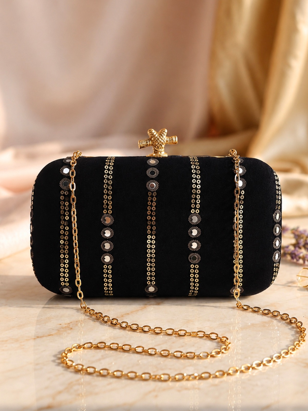 The Noir Linea clutch