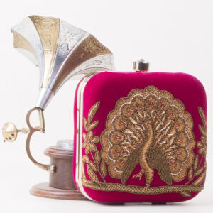 The Velvet Peacock clutch