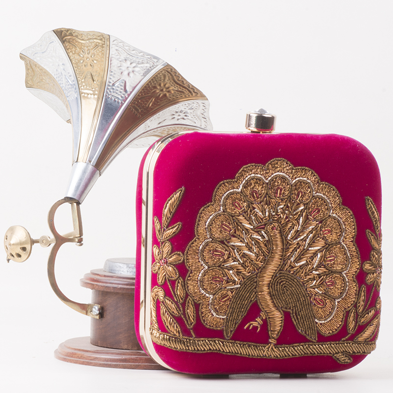 The Velvet Peacock clutch